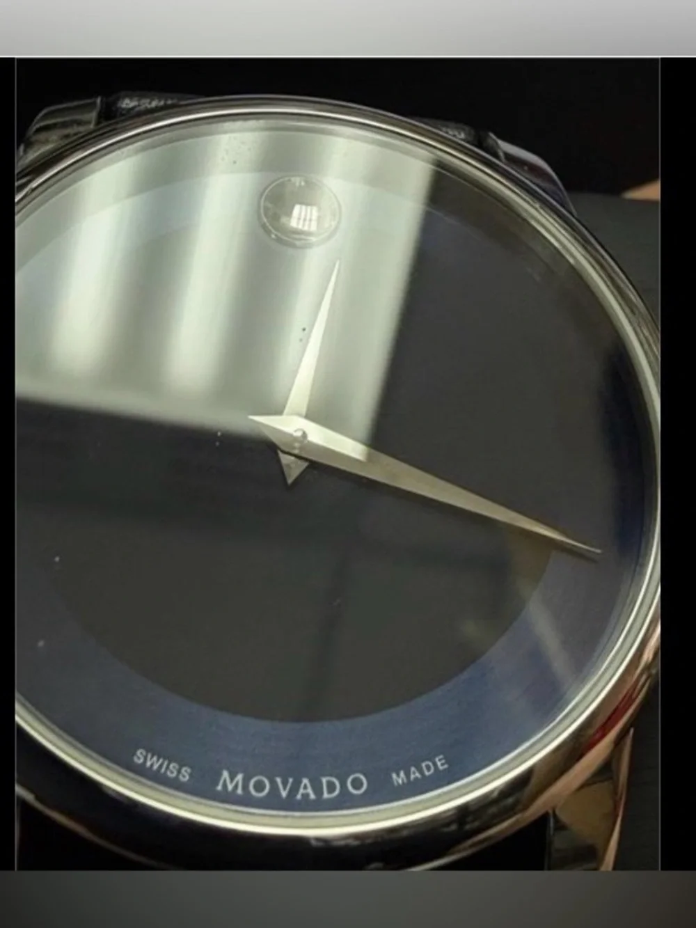 Movado Black Dial Watch with Gold Hands
